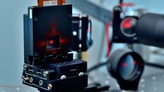 With the optical stamping process, the beam of an ultrashort pulse laser can be precisely shaped into the desired pattern—such as a butterfly in this image. This allows microstructures to be created precisely, reproducibly, and in a fraction of the time previously required.