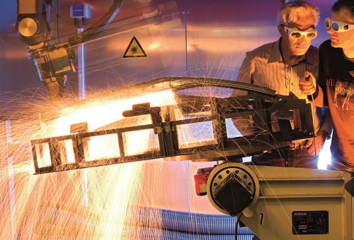 Laser cutting of car body parts made of high-strength steel.